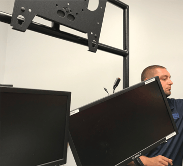Joe B behind Monitor Wall - small